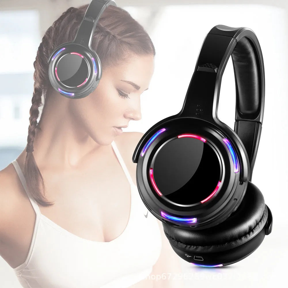 Black silent disco wireless headphones with over-ear design and 3.5mm audio jack on 3 metre cable