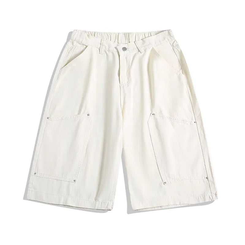 Women's workwear-style cropped pants in wide-leg shorts design with rivet detailing