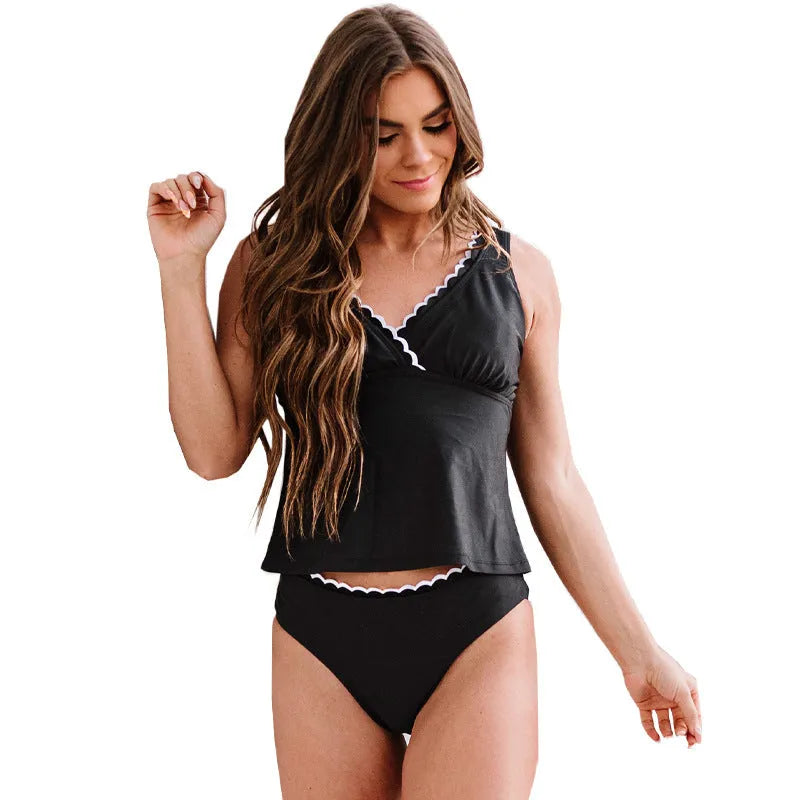 Black women's two-piece sleeveless bikini swimsuit made from nylon fabric.