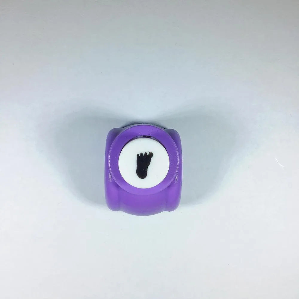 Plastic student stationery embossing device 3x2.5x3cm with decorative pattern