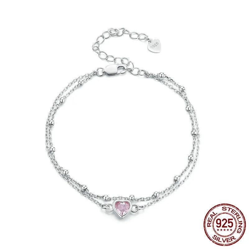 Sweet girlish style 925 sterling silver bracelet with a small heart-shaped pendant on an adjustable chain.