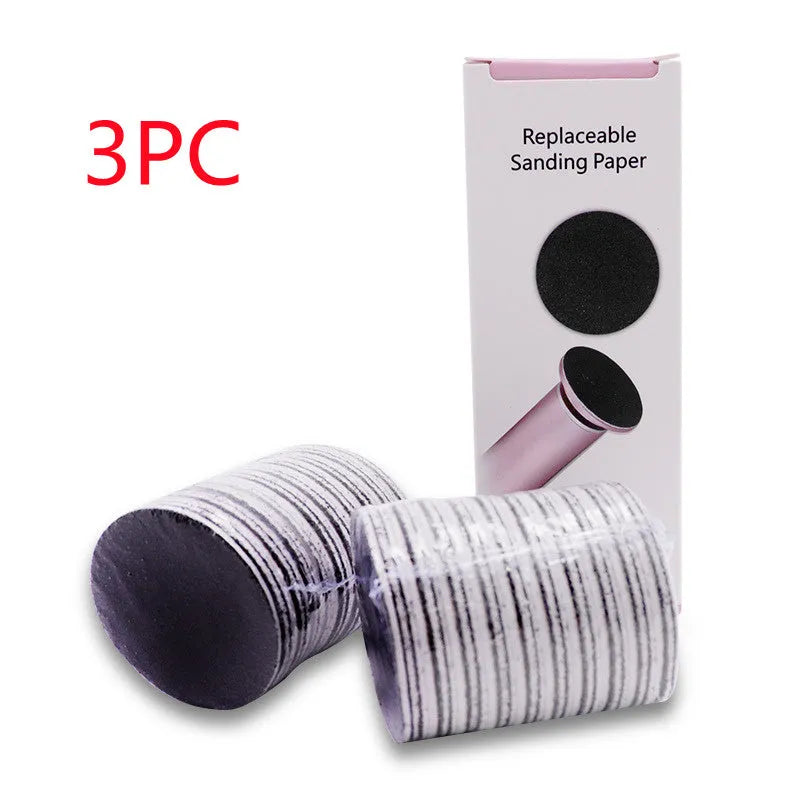 Electric foot callus remover with sandpaper disc attached for removing dead skin and calluses from heels