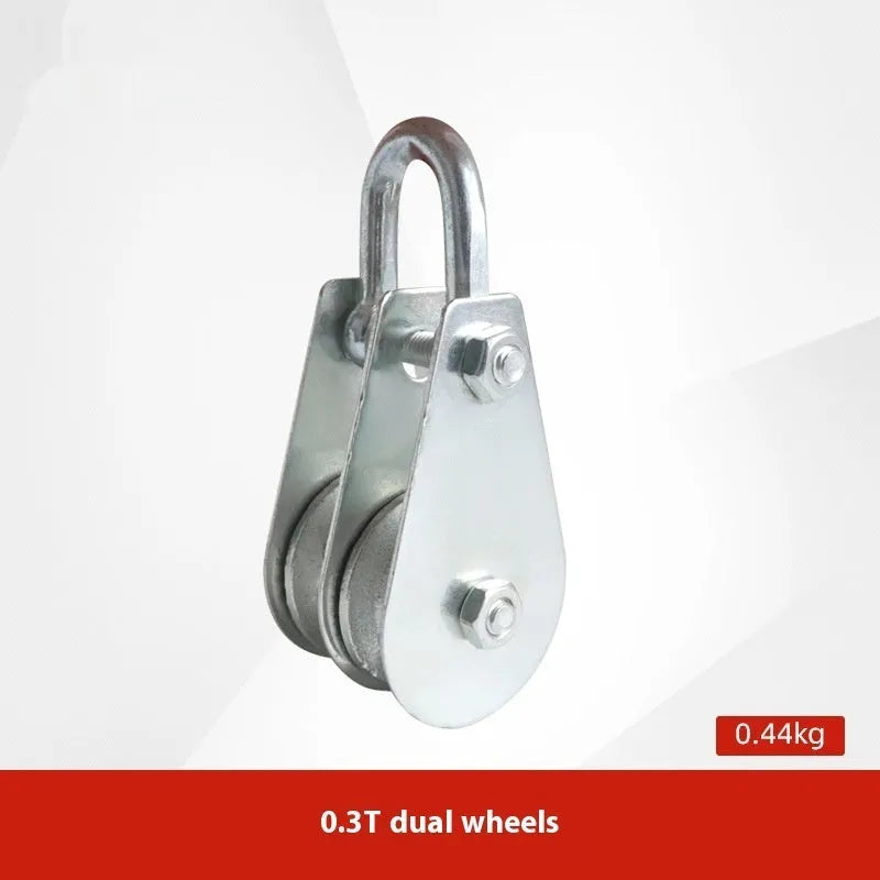 Red industrial lifting pulley with a forged steel safety hook and single wire rope wheel.