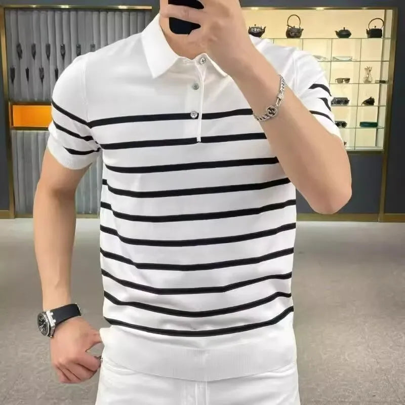 Man wearing a black and white striped knitted T-shirt with a lapel collar, casual style.
