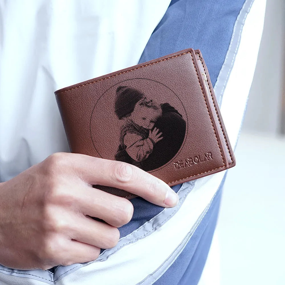 Brown leather men's wallet with a silver zip closure.