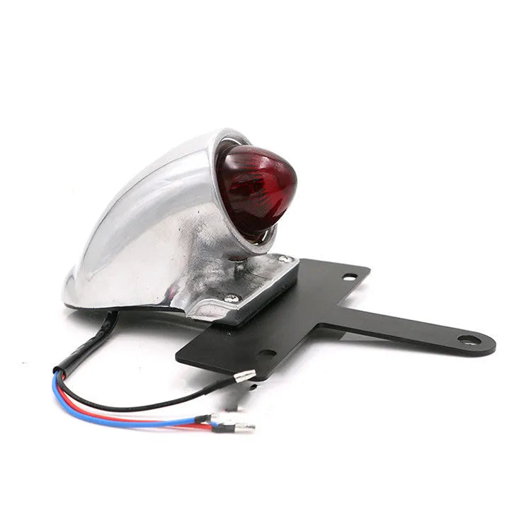 Silver aluminium alloy Lucas-style motorcycle taillight brake light with red lens and 36cm cable on white background