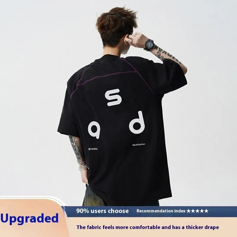 Cotton short-sleeve t-shirt with letter print design in loose fit showing round neck collar