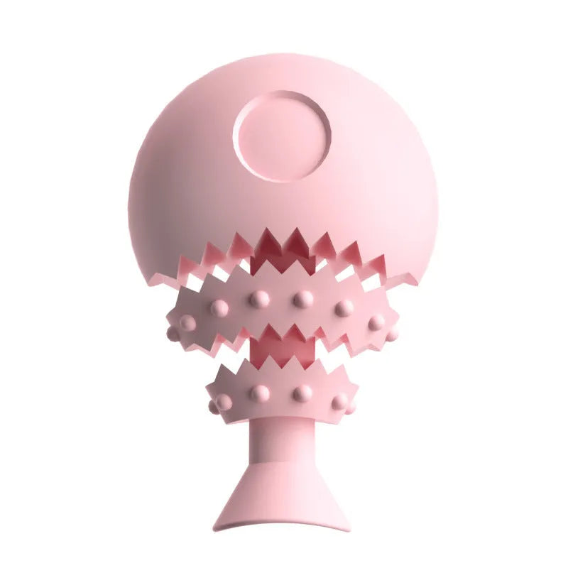Blue fish bone shaped dog chew toy with hollow centre for treats, shown next to a green and pink version.