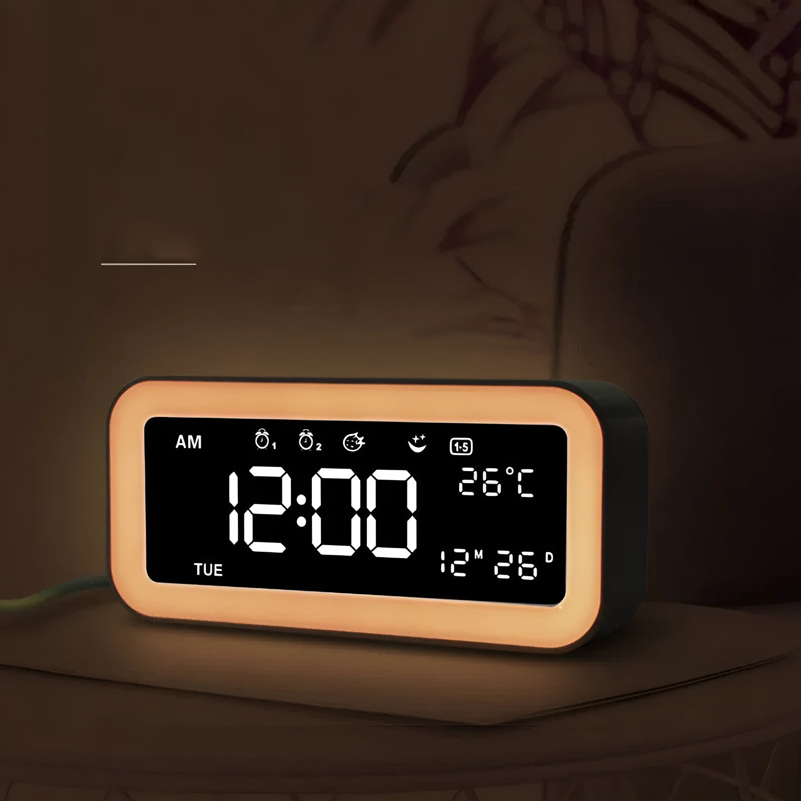 Blue rectangular LED digital alarm clock with multicolour light settings on a wooden surface.