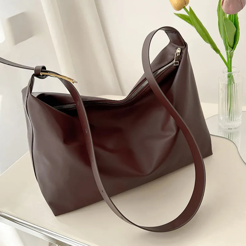 Large capacity simple PU tote bag in black, brown, or coffee colour with single shoulder strap and no lining