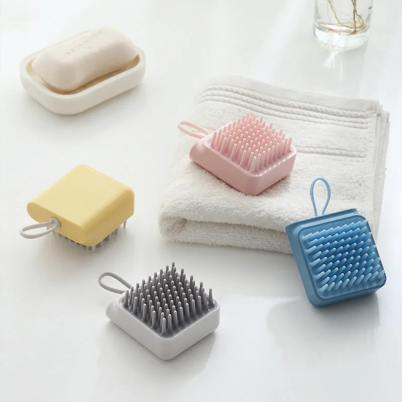 Soft TPR pet bath brush in pink with ergonomic handle for gentle grooming and massage