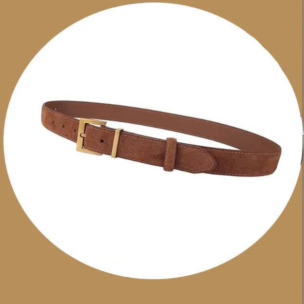 Ladies' black leather belt with alloy pin buckle showing punching texture detail
