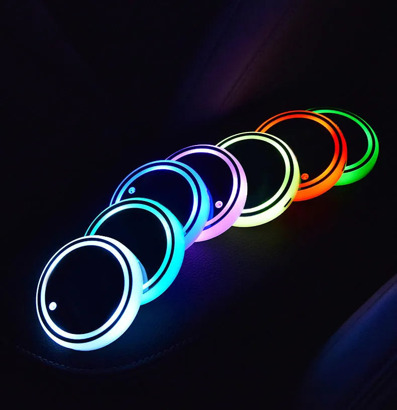 LED light up car cup holder coaster with seven colour options showing solar panel and USB charging port