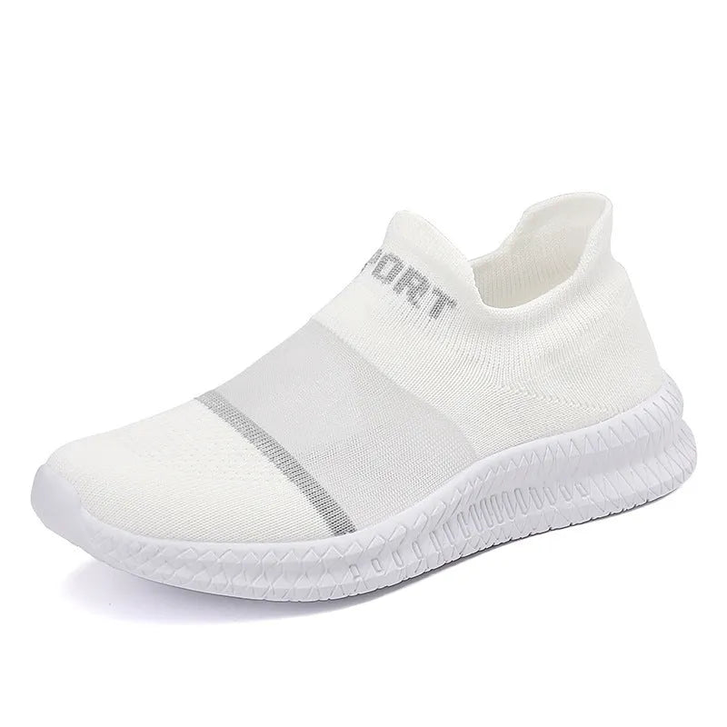 Flyknit casual sock shoes in khaki colour with lace-up front and tassel detail on a flat MD sole.