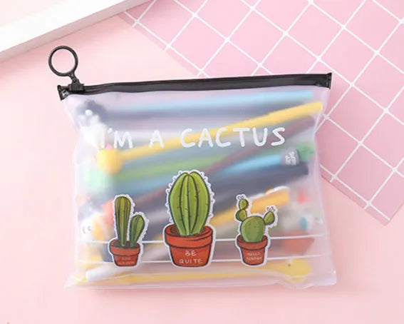 Set of 20 black 0.5mm ballpoint pens with cartoon cactus designs in plastic storage case measuring 21cm by 17cm
