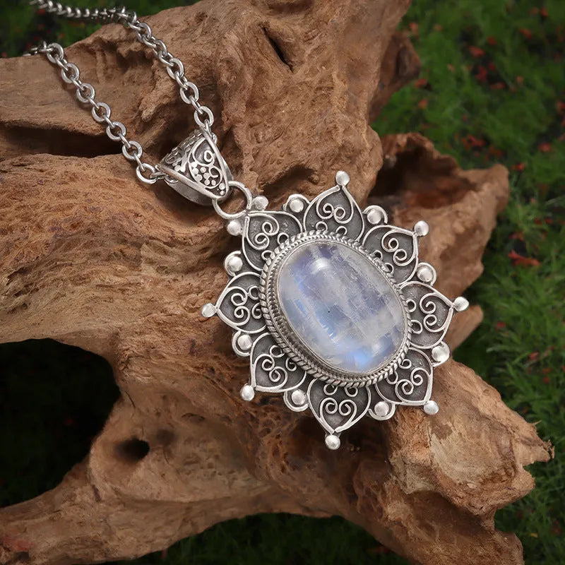 Silver sunflower gemstone pendant necklace on a 51-60cm adjustable clavicle chain with electroplated finish.