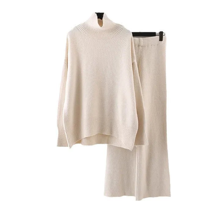 Women's casual two-piece set showing sweater and wide leg trousers in solid colour with thread detail