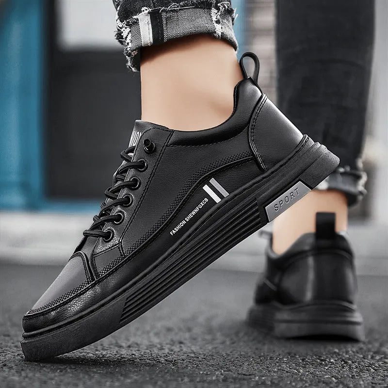 Men's white low-top skate shoes with a microfiber upper and elastic band, shown on a grey background.