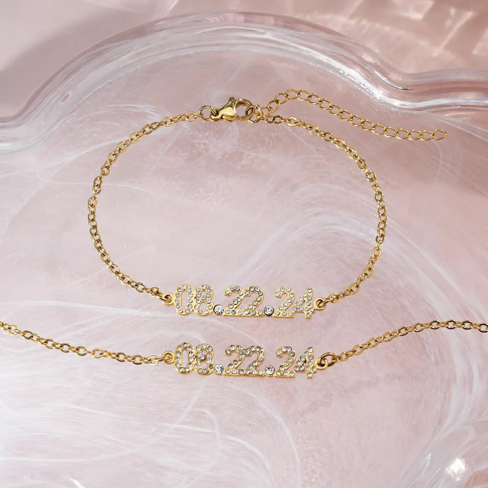 Stainless steel digital bracelet with diamond-set numbers on display, shown in rose gold, gold, and steel colour variants.