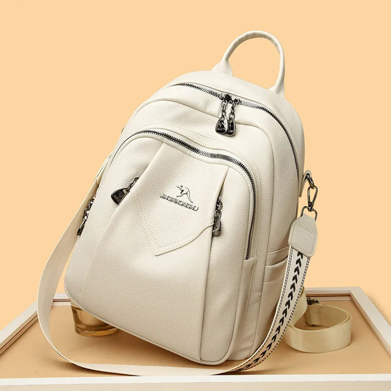 Genuine leather geometric patchwork student backpack with metal belt decoration, waterproof and wear-resistant, in black beige and yellow