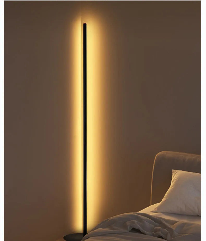 Simple vertical aluminium alloy floor lamp with LED light source on a modern stand.