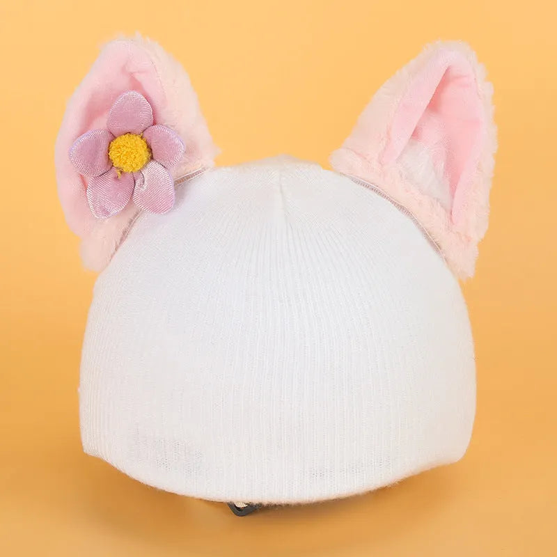 Plush fabric motorcycle helmet liner and cartoon-themed ear covers set in size M.