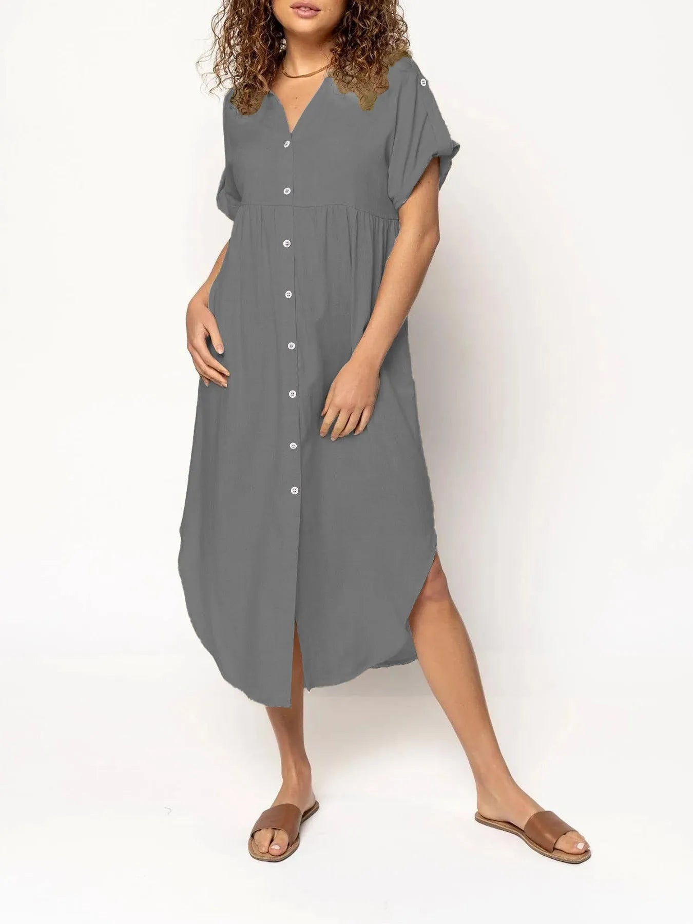 Loose temperament mid-length casual dress with button detailing in polyester fabric